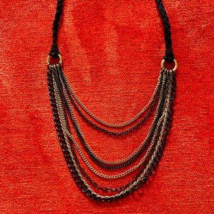 Tiered Black and Gold Chains on a Black Braided Felt Necklace